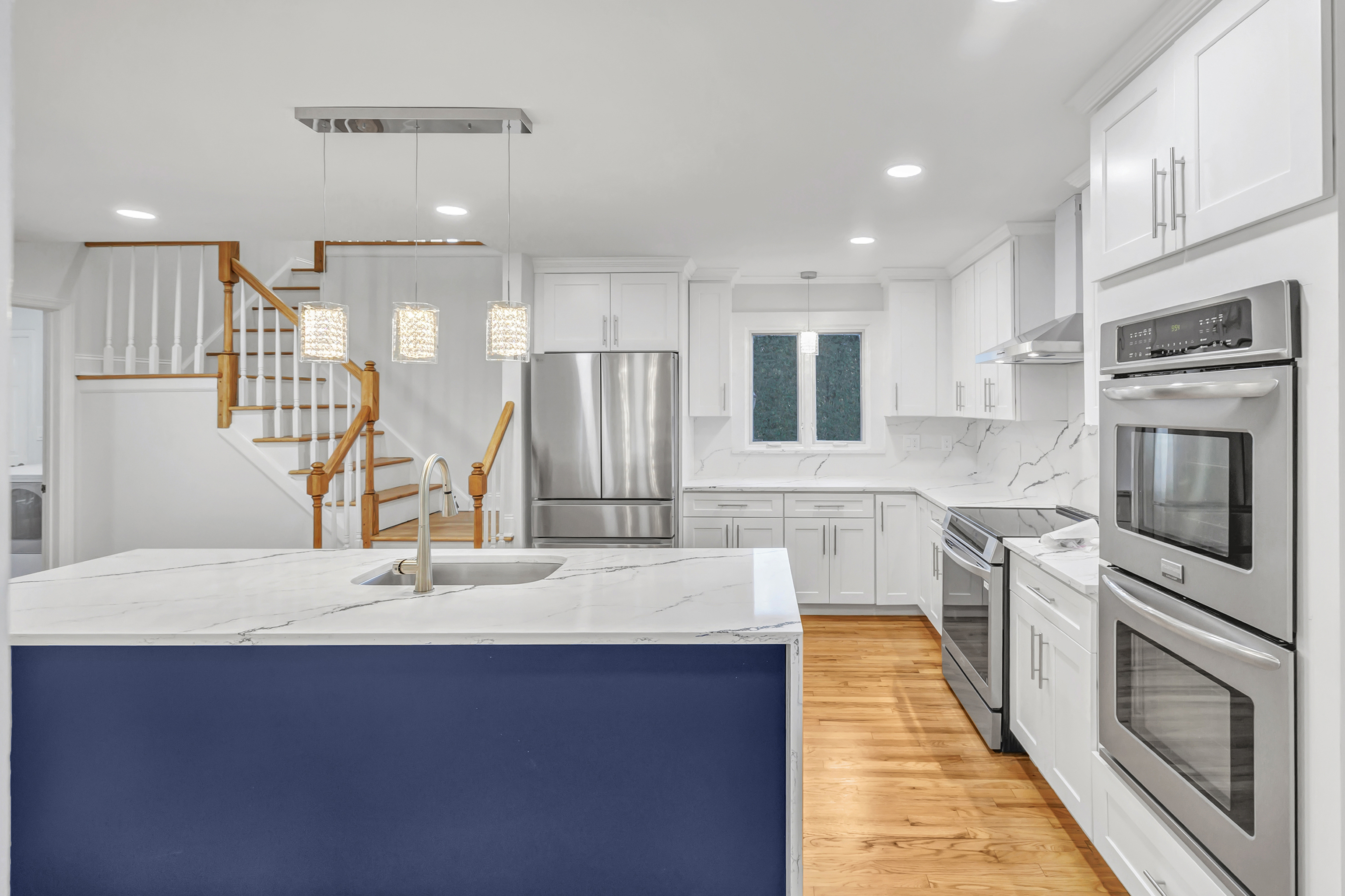 93 Putting Green Road North Trumbull, CT 06611 - Photo 8 of 40 a kitchen with stainless steel appliances a sink stove and refrigerator