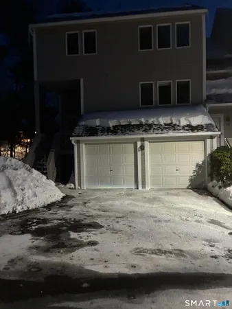 a bathroom with a granite countertop sink and a stove