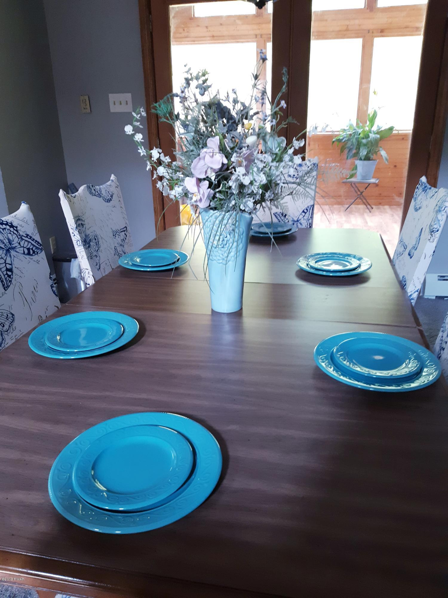 110 Weasel Road Dingmans Ferry, PA 18328 - Photo 26 of 39 a view of a dining room with furniture