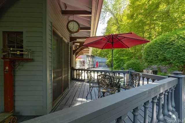 a view of balcony with furniture