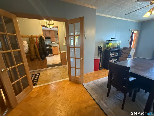 a kitchen with stainless steel appliances granite countertop a sink refrigerator and microwave