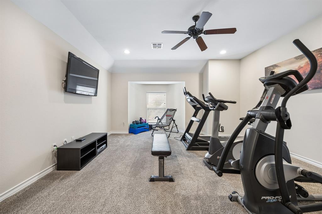 1011 Three Rivers Drive Prosper, TX 75078 - Photo 14 of 27 a view of a room with gym equipment