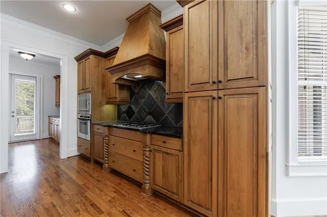 a bathroom with a tub a sink and shower