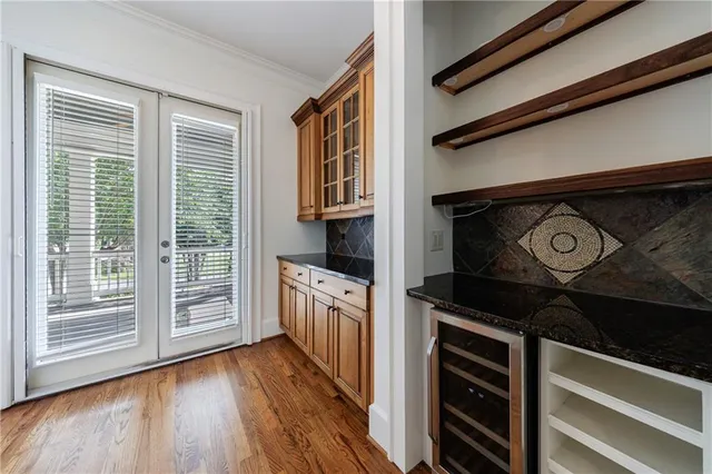 a spacious bathroom with a shower sink and mirror