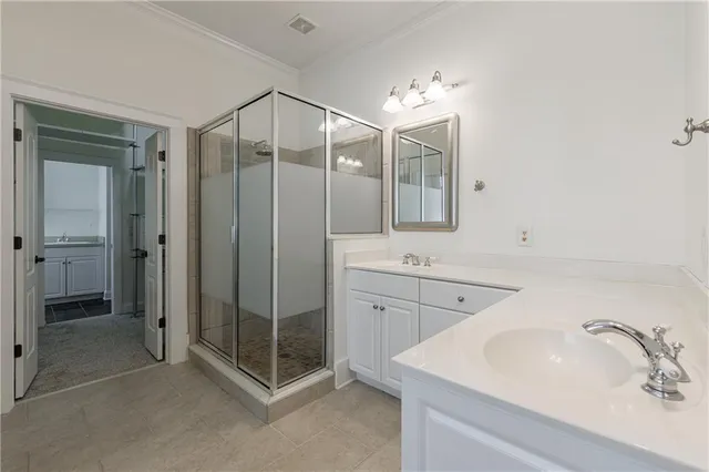a view of a livingroom with a ceiling fan and window