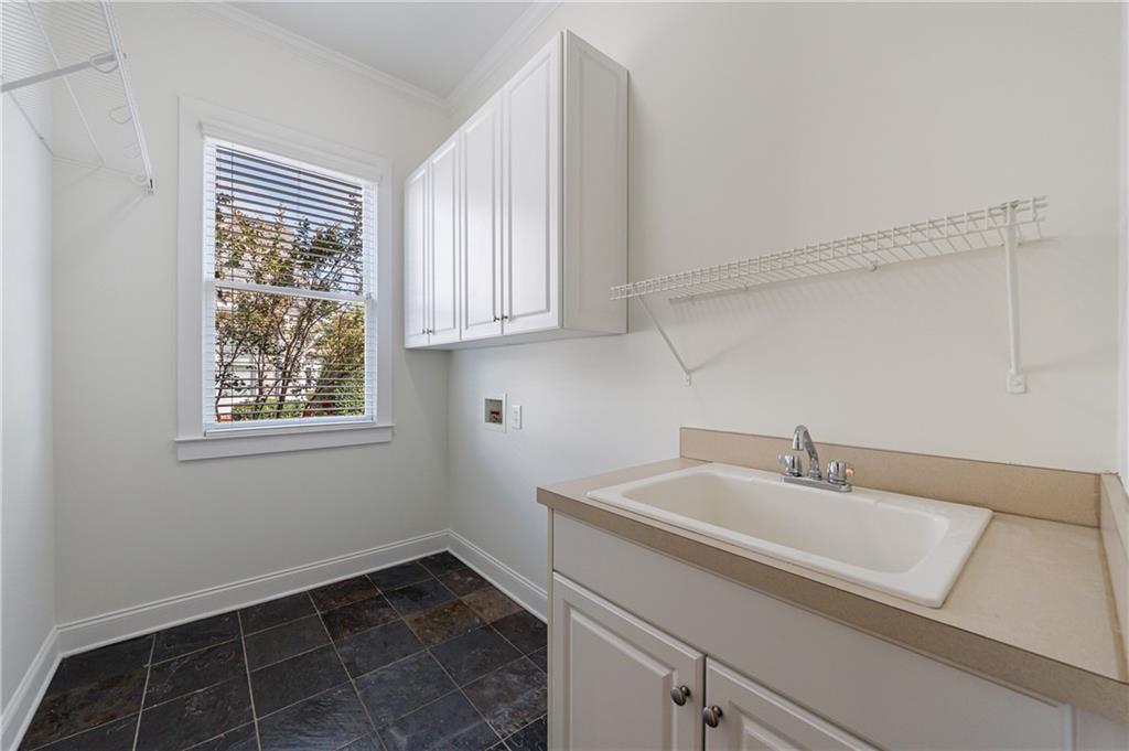 2370 Muskogee Lane Braselton, GA 30517 - Photo 22 of 27 a bathroom with a sink and a window