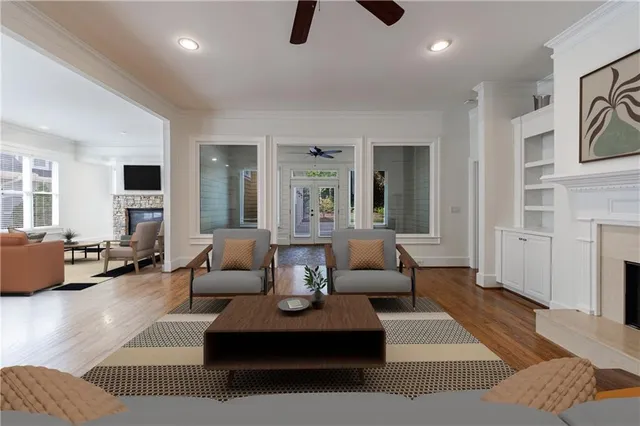 a living room with furniture and a fireplace
