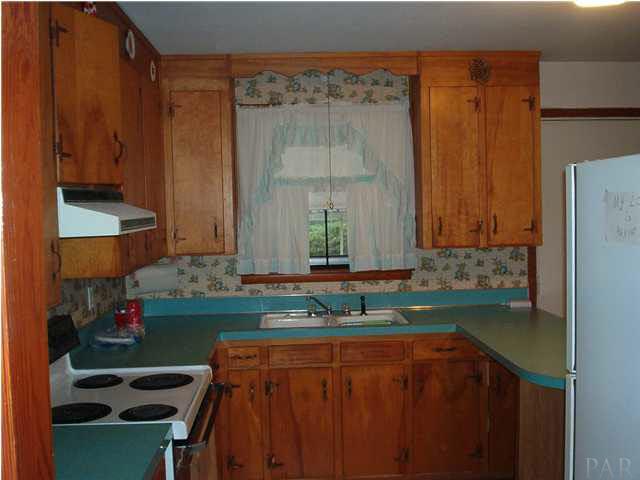 121 Majors Road Pensacola, FL 32503 - Photo 5 of 9 Kitchen view from hall