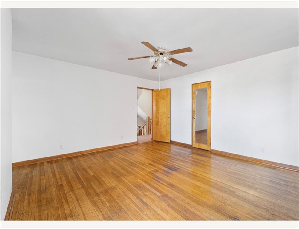 4745 Friendship Avenue Pittsburgh, PA 15224 - Photo 12 of 25 a view of room with wooden floor and ceiling fan