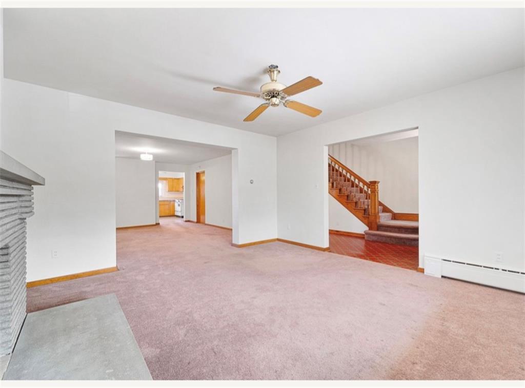 4745 Friendship Avenue Pittsburgh, PA 15224 - Photo 6 of 25 a view of a livingroom with a ceiling fan and window