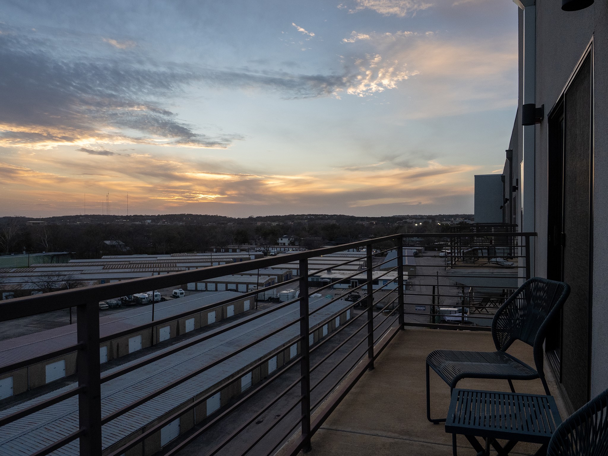 6444 Burnet Road, Unit 509 Austin, TX 78757 - Photo 31 of 32 Witness magnificent sunsets from this spacious, concrete balcony.