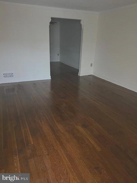 1930 Frames Road Dundalk, MD 21222 - Photo 5 of 5 an empty room with wooden floor