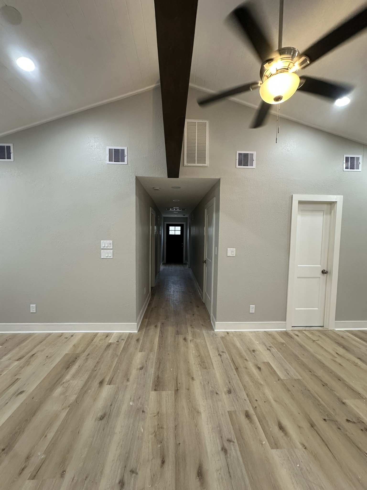 8223 Wallis Street Fulshear, TX 77441 - Photo 12 of 30 a view of a livingroom with a chandelier