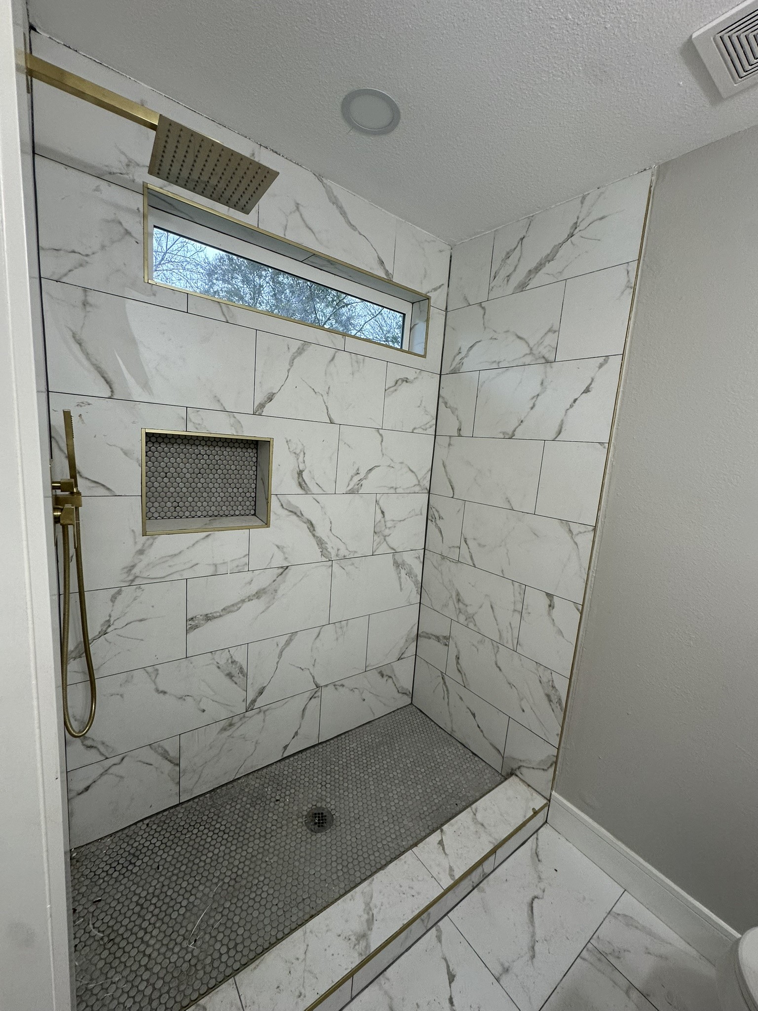 8223 Wallis Street Fulshear, TX 77441 - Photo 24 of 30 a bathroom with a shower