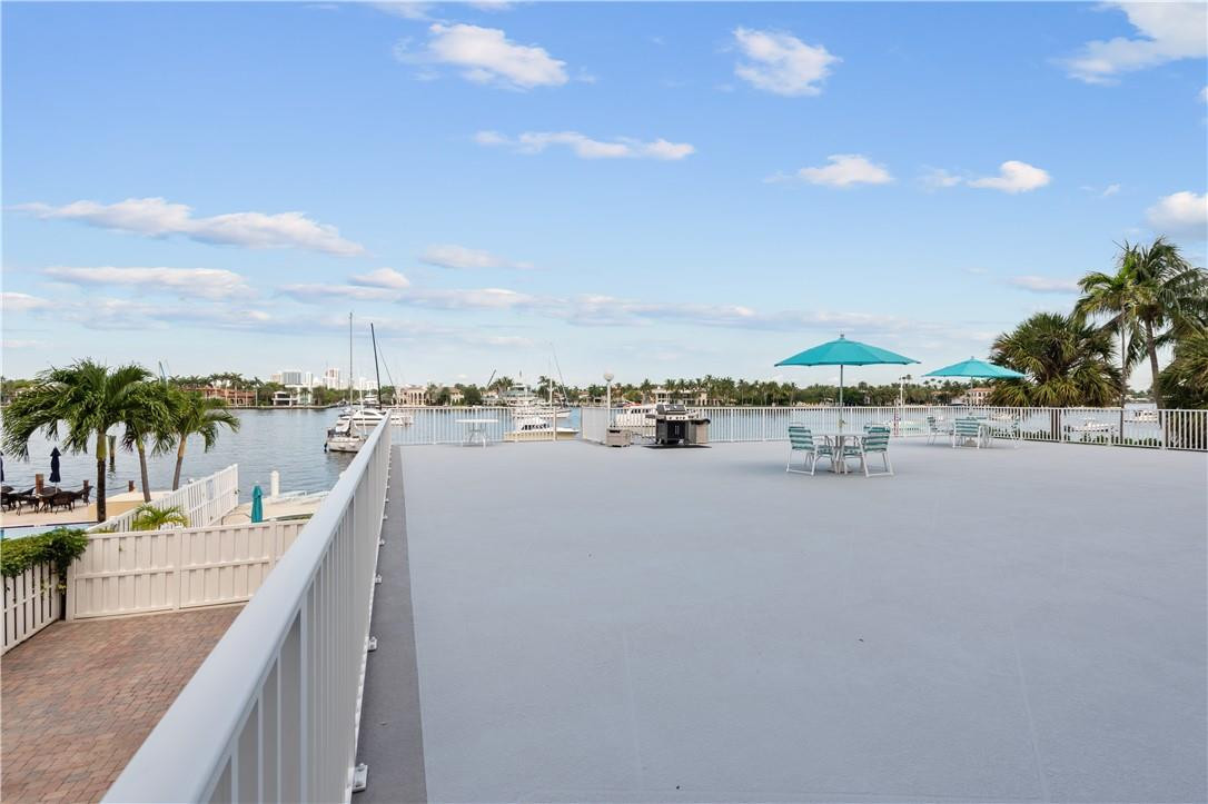 95 North Birch Road, Unit 405 Fort Lauderdale, FL 33304 - Photo 31 of 34 a view of a lake with outdoor space