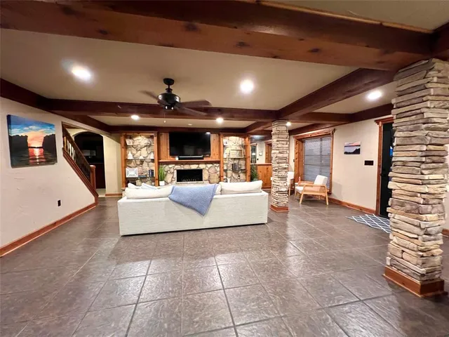 a dining room with furniture and wooden floor