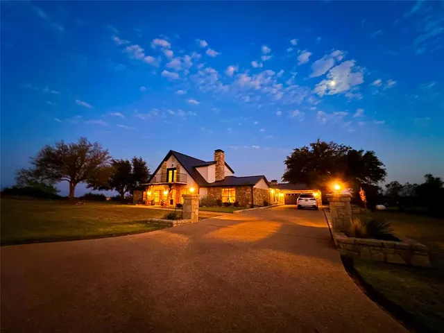 a view of an outdoor space with swimming pool in the backyard