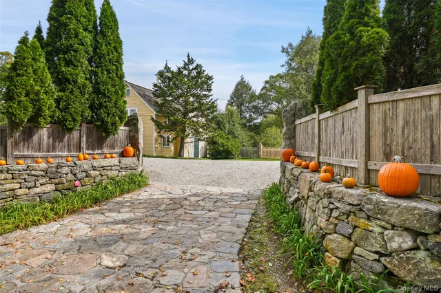 a view of a backyard of the house