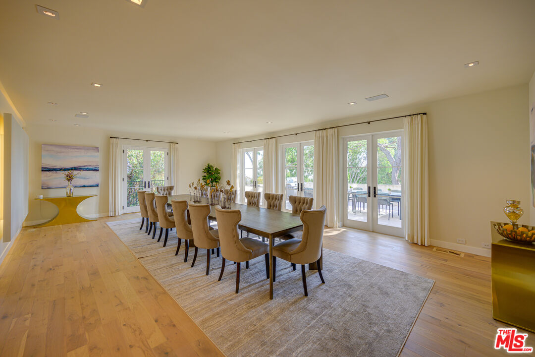 1235 Tower Road Beverly Hills, CA 90210 - Photo 11 of 31 a view of a dining room with furniture