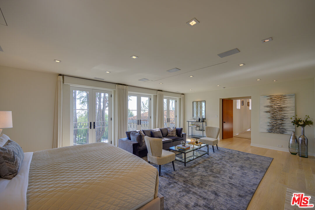 1235 Tower Road Beverly Hills, CA 90210 - Photo 20 of 31 a living room with furniture and wooden floor