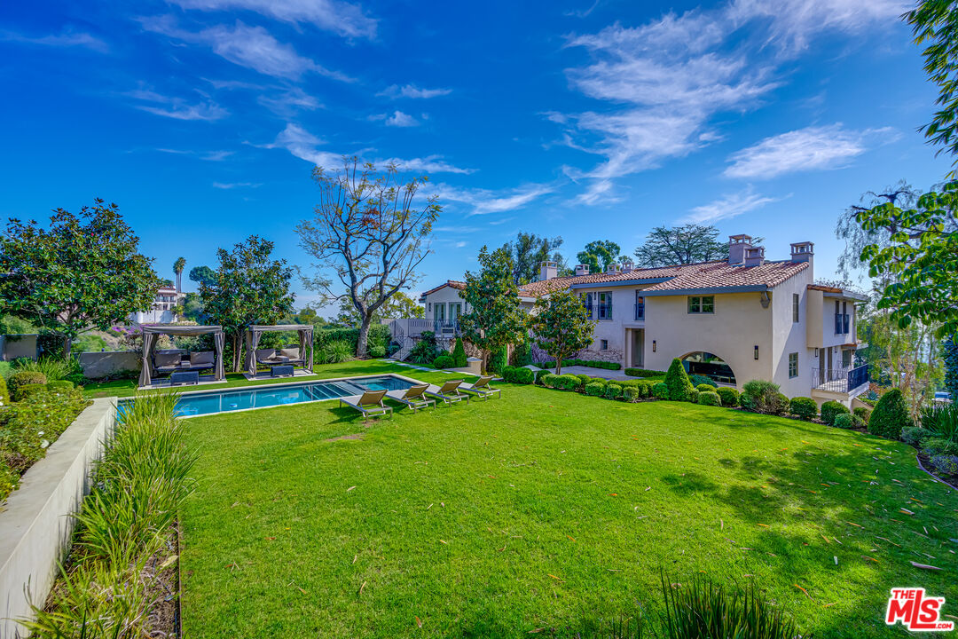1235 Tower Road Beverly Hills, CA 90210 - Photo 29 of 31 a view of a house with backyard and garden