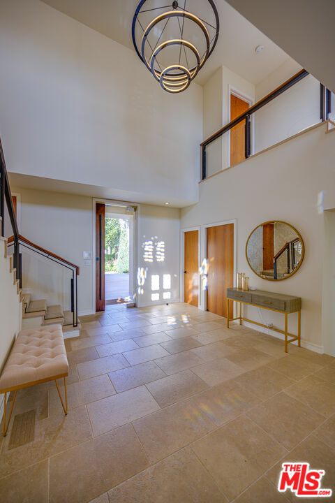 1235 Tower Road Beverly Hills, CA 90210 - Photo 7 of 31 a view of an entryway with a workspace