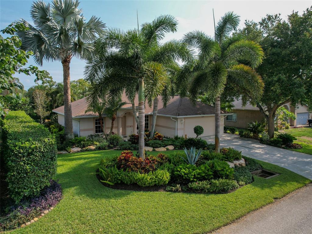 655 Missouri Road Venice, FL 34293 - Photo 1 of 1 Tropical Oasis