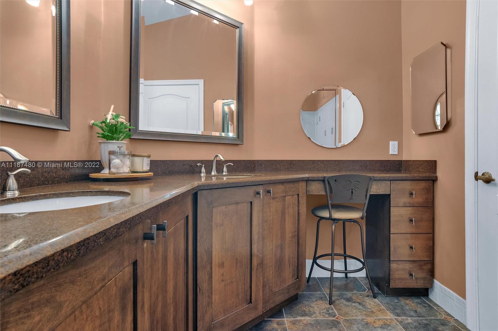Jacaranda Plantation, FL 33324 - Photo 19 of 43 a bathroom with a sink and a mirror