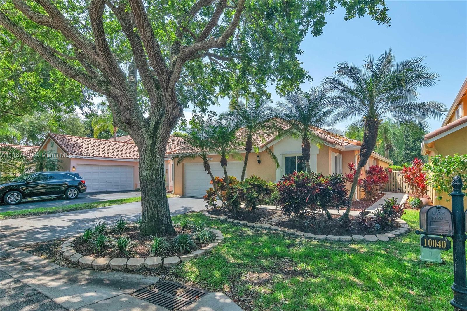 Jacaranda Plantation, FL 33324 - Photo 32 of 43 a front view of a house with garden