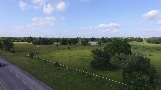 a view of a lake from a yard