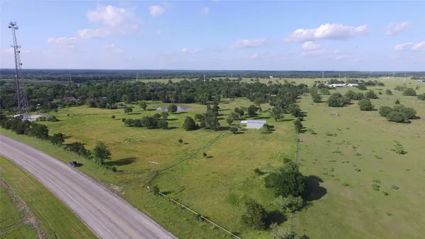a view of a lake with a yard