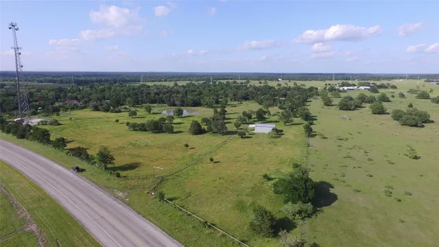 a view of a lake with a yard