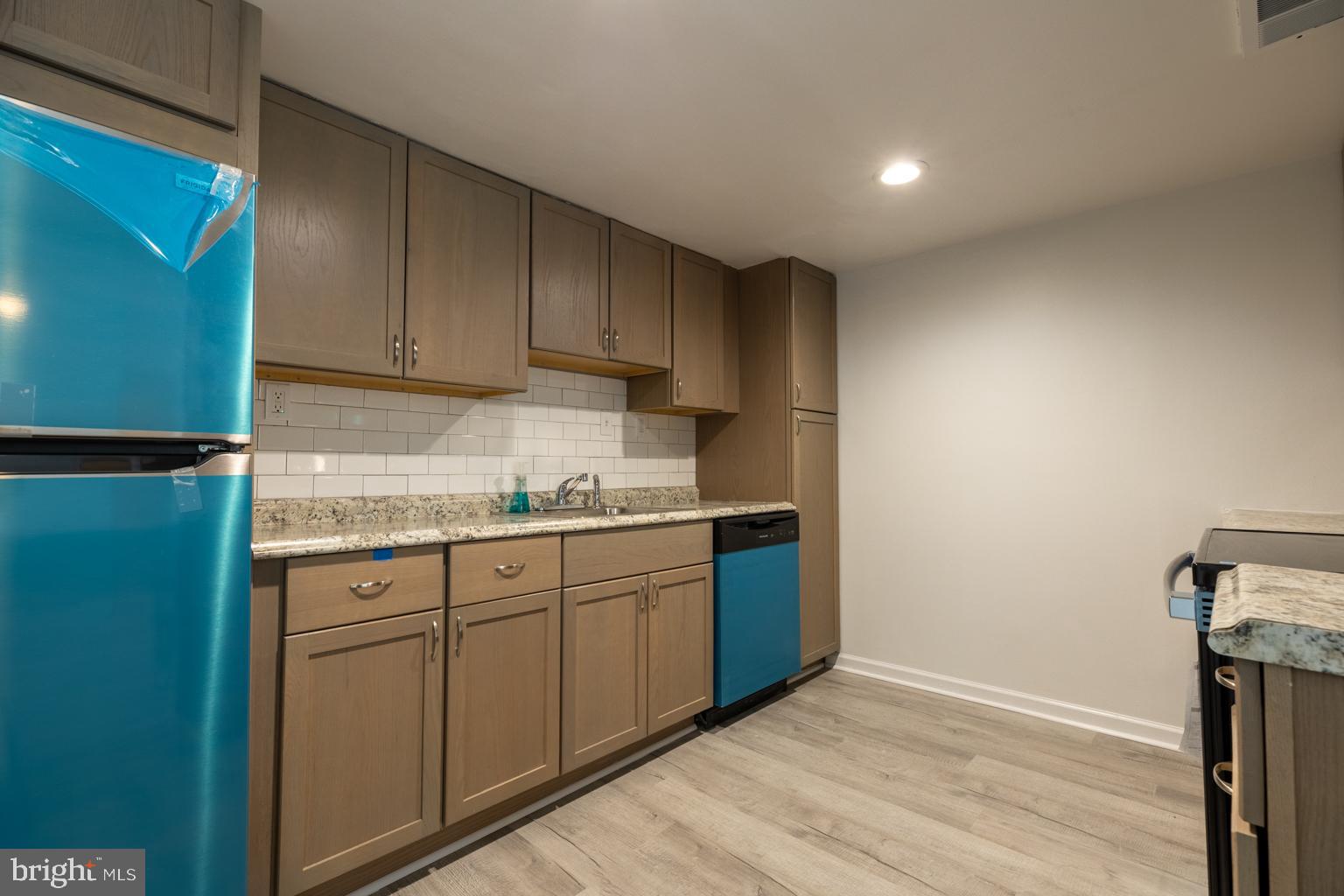 5 Farragut Court Willingboro, NJ 08046 - Photo 15 of 51 a kitchen with granite countertop cabinets sink and stove