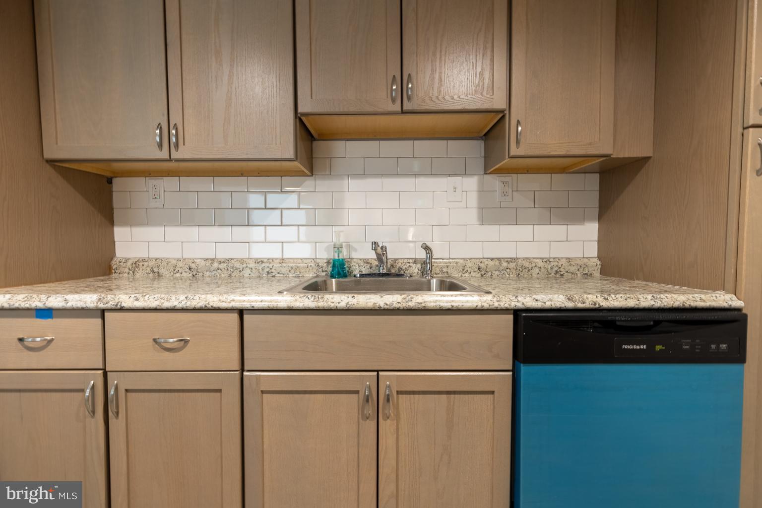 5 Farragut Court Willingboro, NJ 08046 - Photo 19 of 51 a kitchen with granite countertop cabinets sink and stove