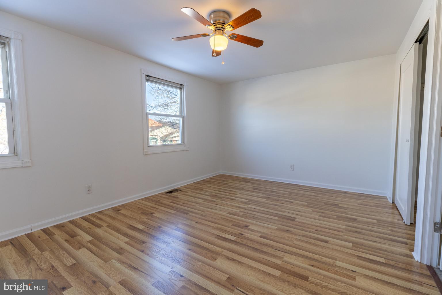 5 Farragut Court Willingboro, NJ 08046 - Photo 23 of 51 wooden floor in an empty room with a window