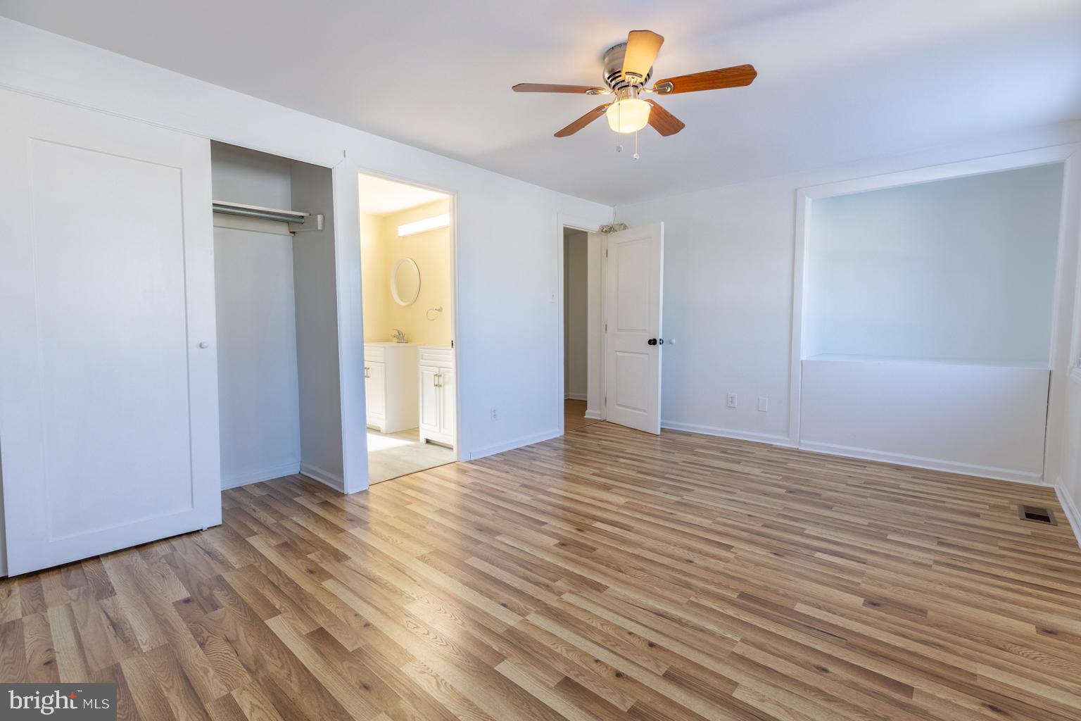 5 Farragut Court Willingboro, NJ 08046 - Photo 25 of 51 a view of a big room with wooden floor and a chandelier fan
