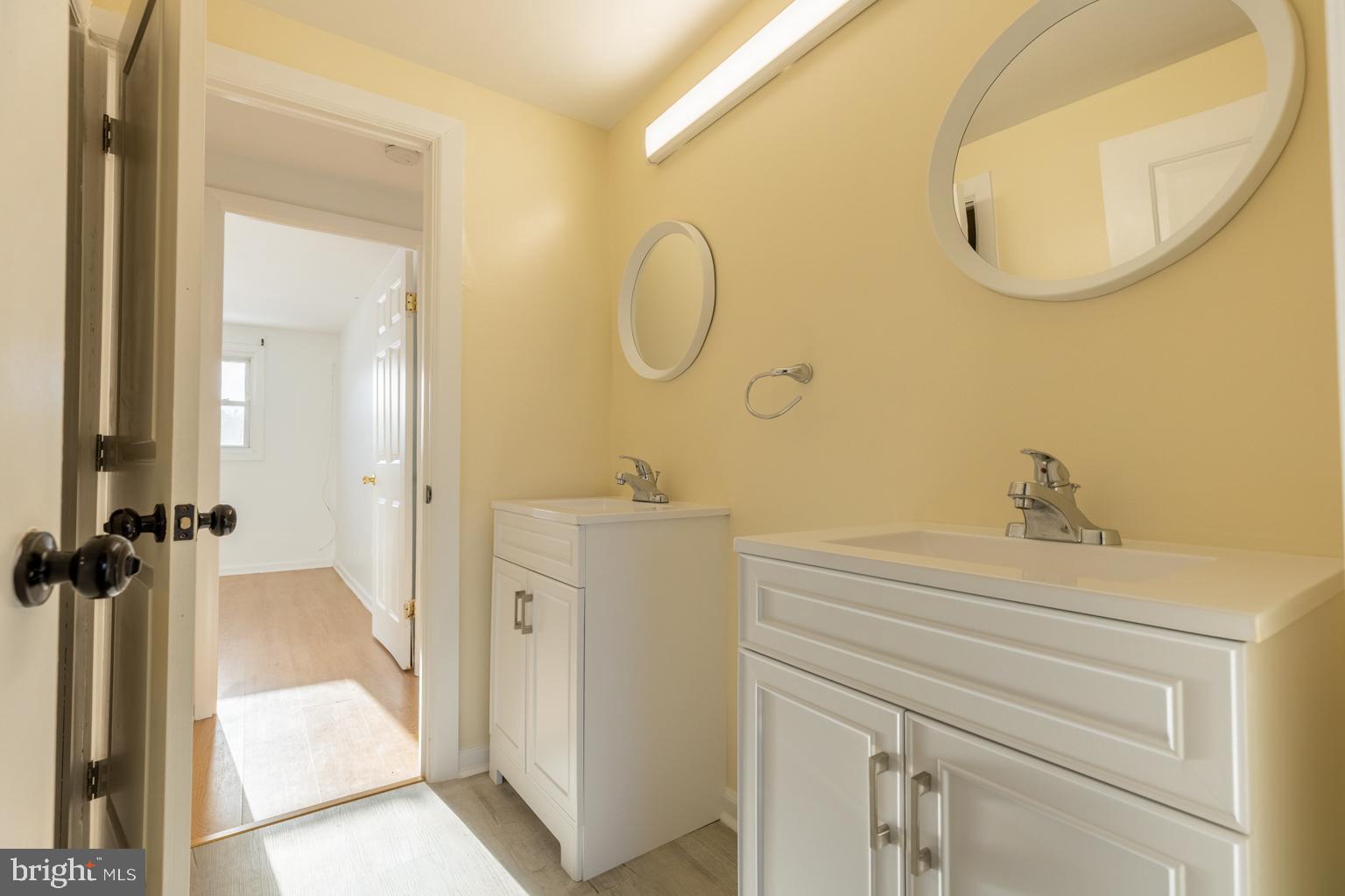 5 Farragut Court Willingboro, NJ 08046 - Photo 26 of 51 a bathroom with a sink and a mirror