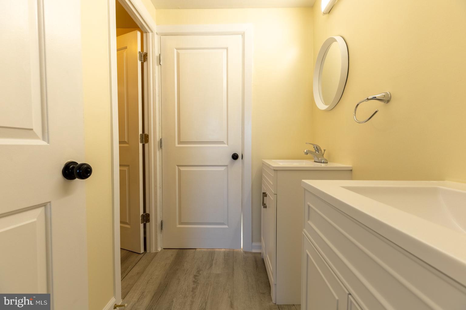 5 Farragut Court Willingboro, NJ 08046 - Photo 32 of 51 a bathroom with a sink and a mirror