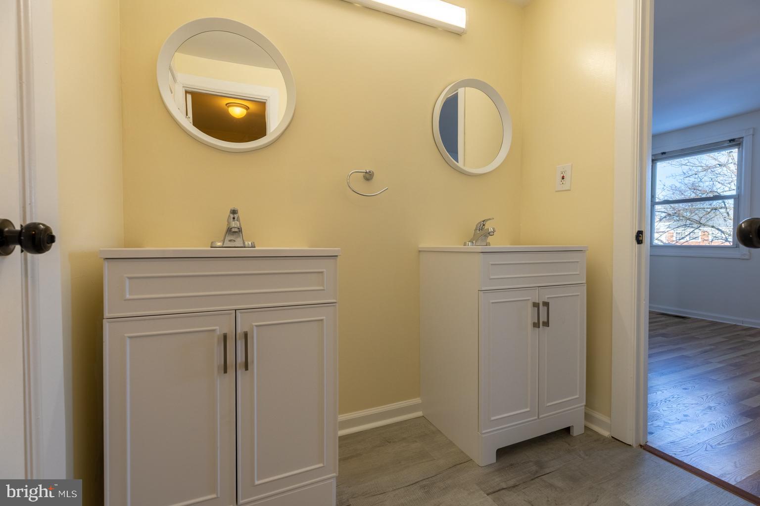5 Farragut Court Willingboro, NJ 08046 - Photo 34 of 51 a bathroom with a sink and a mirror