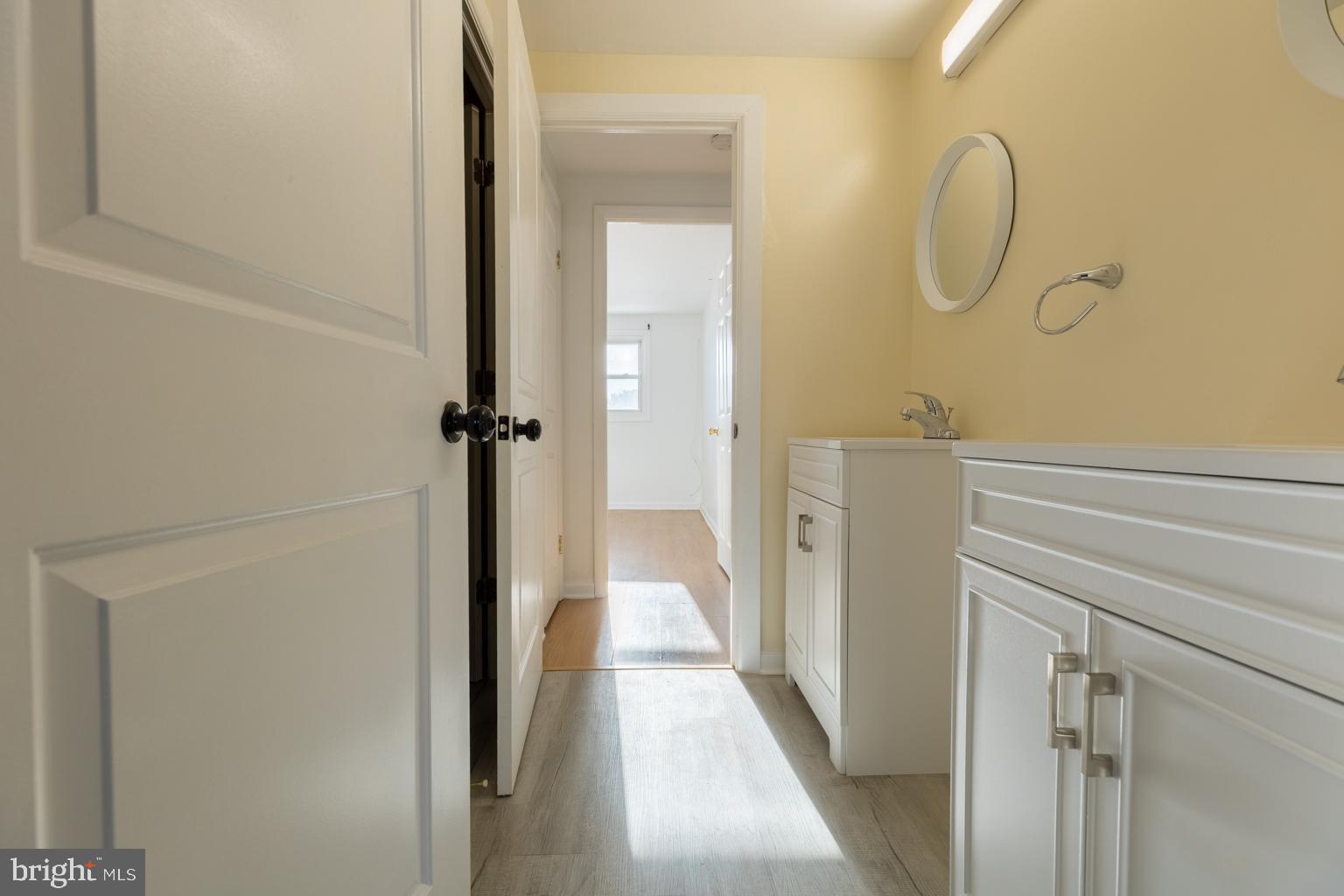 5 Farragut Court Willingboro, NJ 08046 - Photo 36 of 51 a bathroom with a shower and a mirror