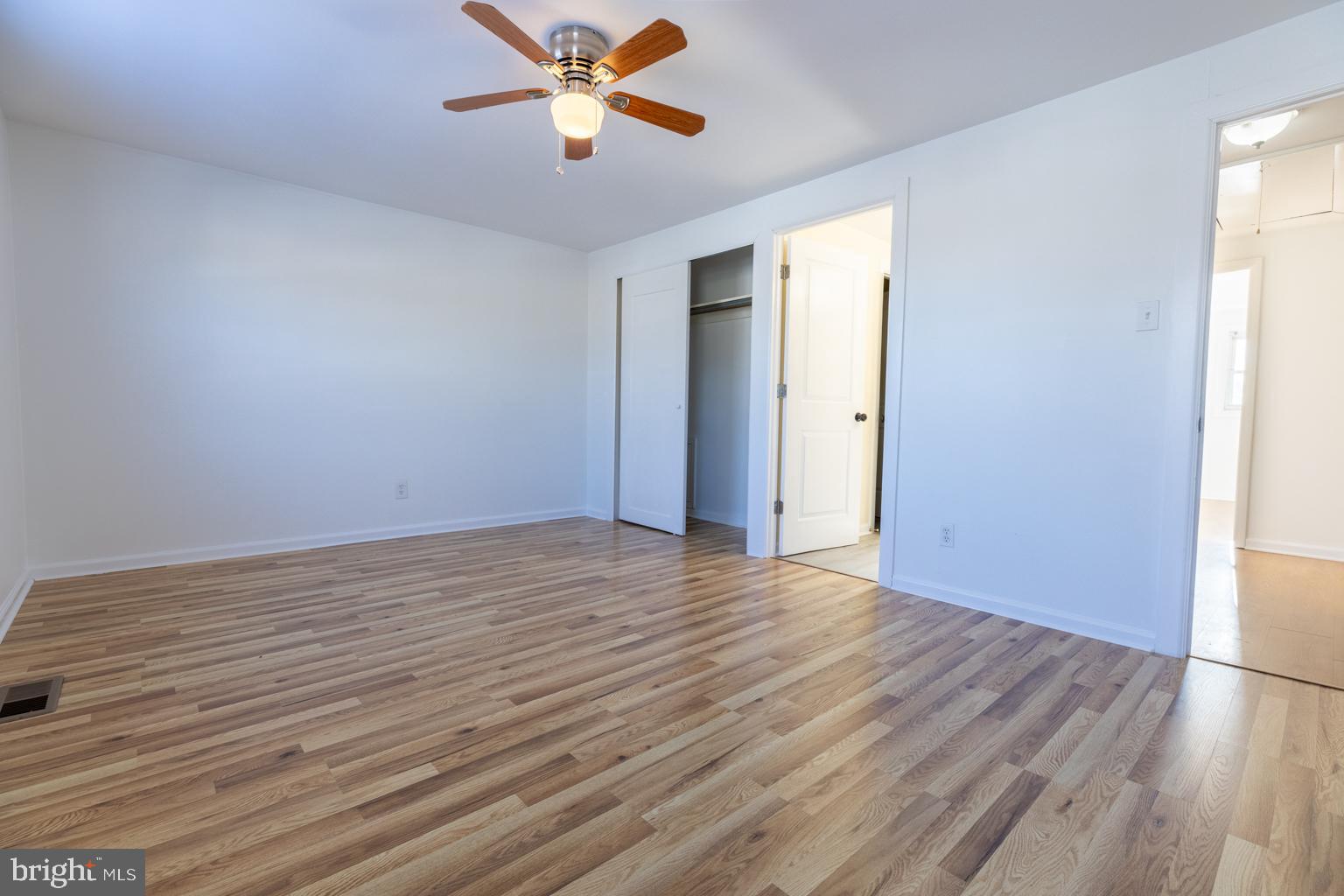 5 Farragut Court Willingboro, NJ 08046 - Photo 39 of 51 a view of empty room with wooden floor and fan