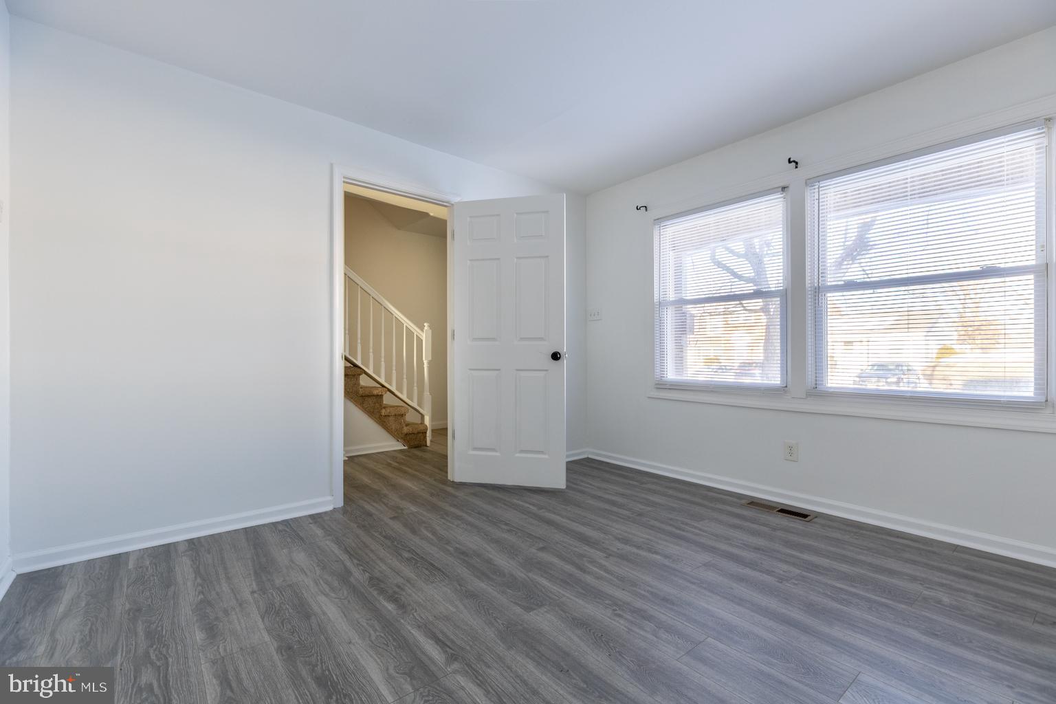 5 Farragut Court Willingboro, NJ 08046 - Photo 4 of 51 an empty room with wooden floor and windows