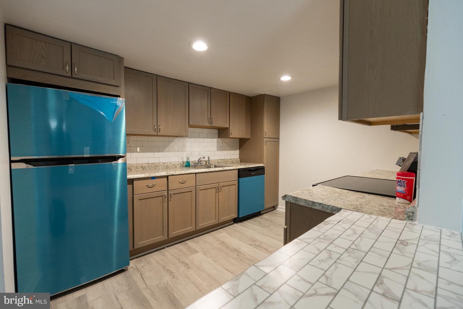 5 Farragut Court Willingboro, NJ 08046 - Photo 49 of 51 a kitchen with a sink cabinets and appliances