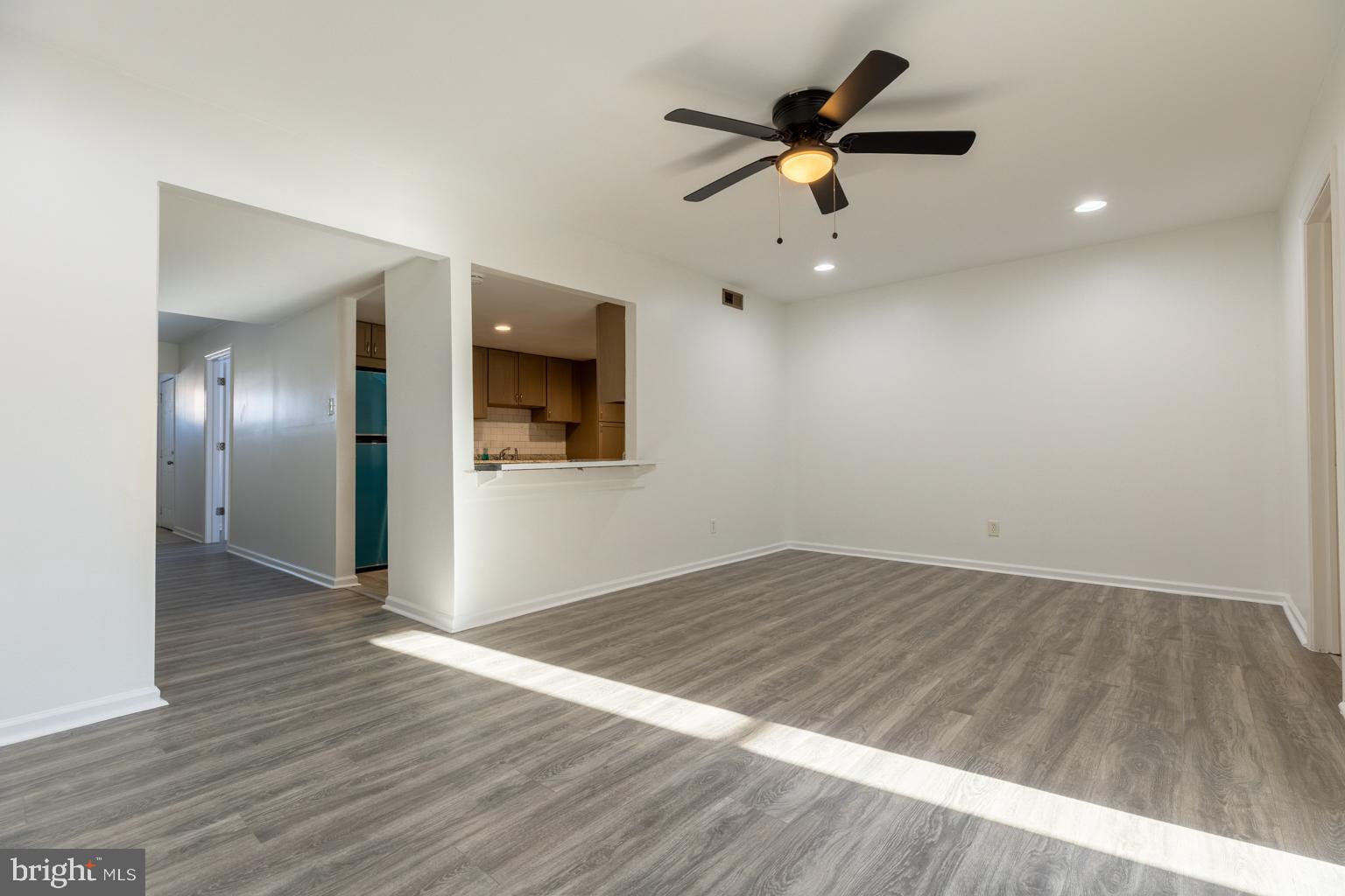 5 Farragut Court Willingboro, NJ 08046 - Photo 6 of 51 wooden floor in an empty room with a window