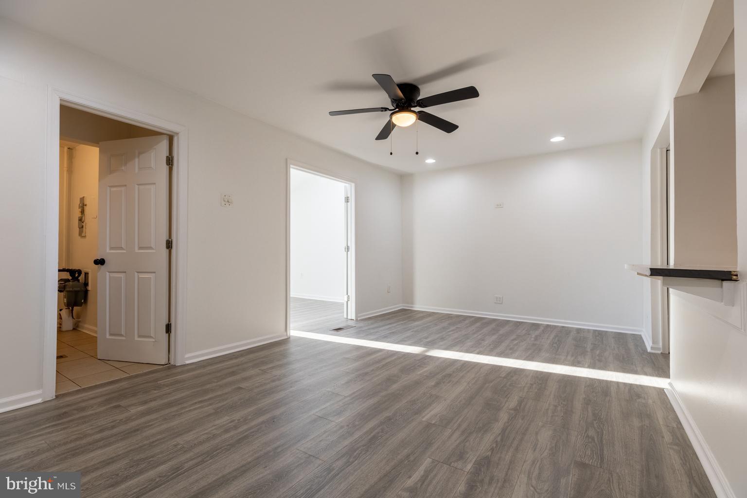 5 Farragut Court Willingboro, NJ 08046 - Photo 7 of 51 wooden floor in an empty room with a window