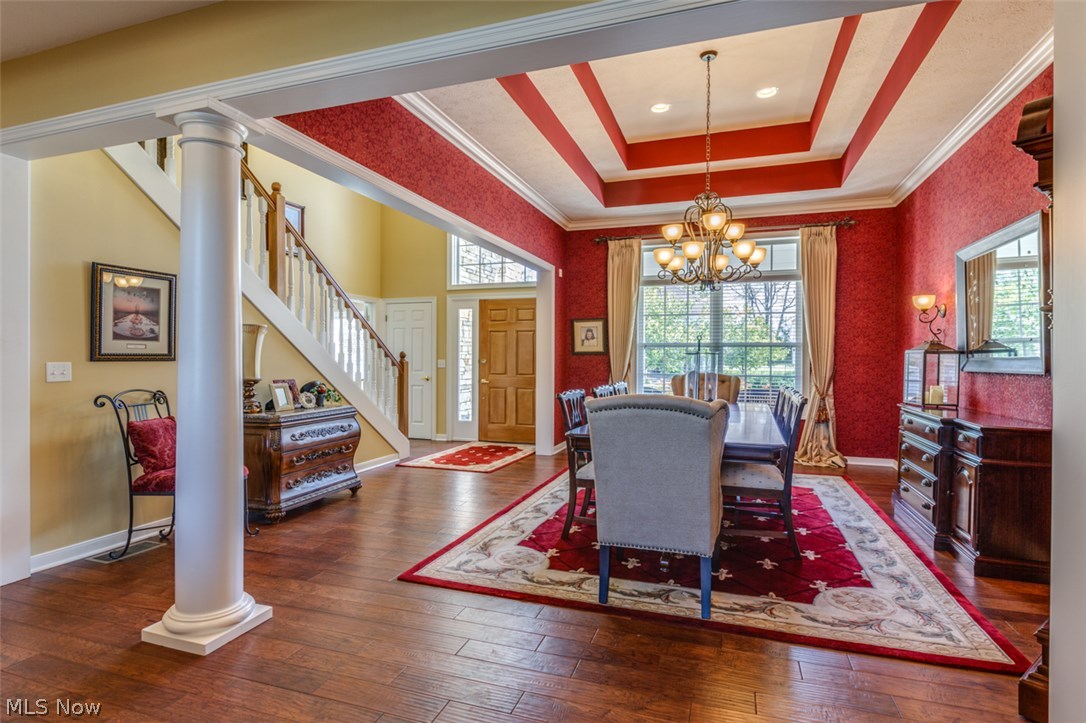 322 Burwick Road Cleveland, OH 44143 - Photo 2 of 25 As you can see when you walk into the foyer entrance the first thing you see is this gorgeous formal open dining room but you're also looking into the great room which is also magnificent!