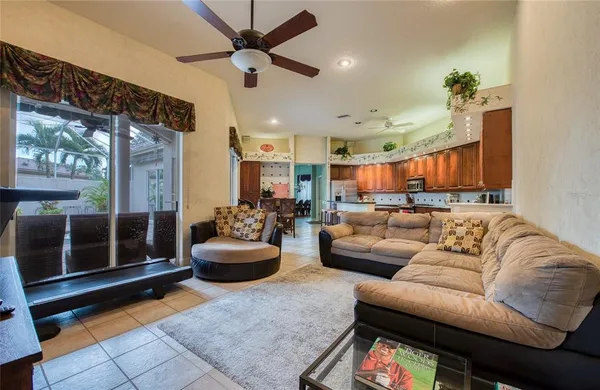 a living room with furniture and a rug