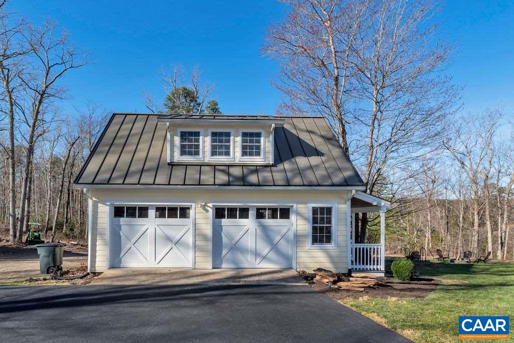 7920 Chestnut Grove Road Esmont, VA 22937 - Photo 17 of 34 a front view of a house with a yard