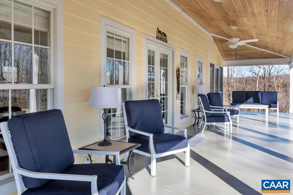 7920 Chestnut Grove Road Esmont, VA 22937 - Photo 27 of 34 a view of a dining room with furniture window and outside view