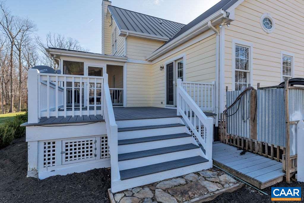 7920 Chestnut Grove Road Esmont, VA 22937 - Photo 30 of 34 a view of a house with wooden fence